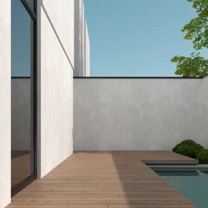 Sleek modern patio featuring wooden decking, a reflective glass door, and a tranquil pool.