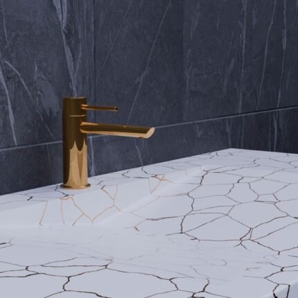 Elegant gold faucet on cracked white marble countertop in a modern bathroom setting.